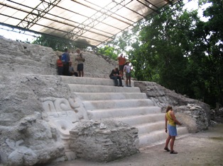View of steps on a monument with people in the background.